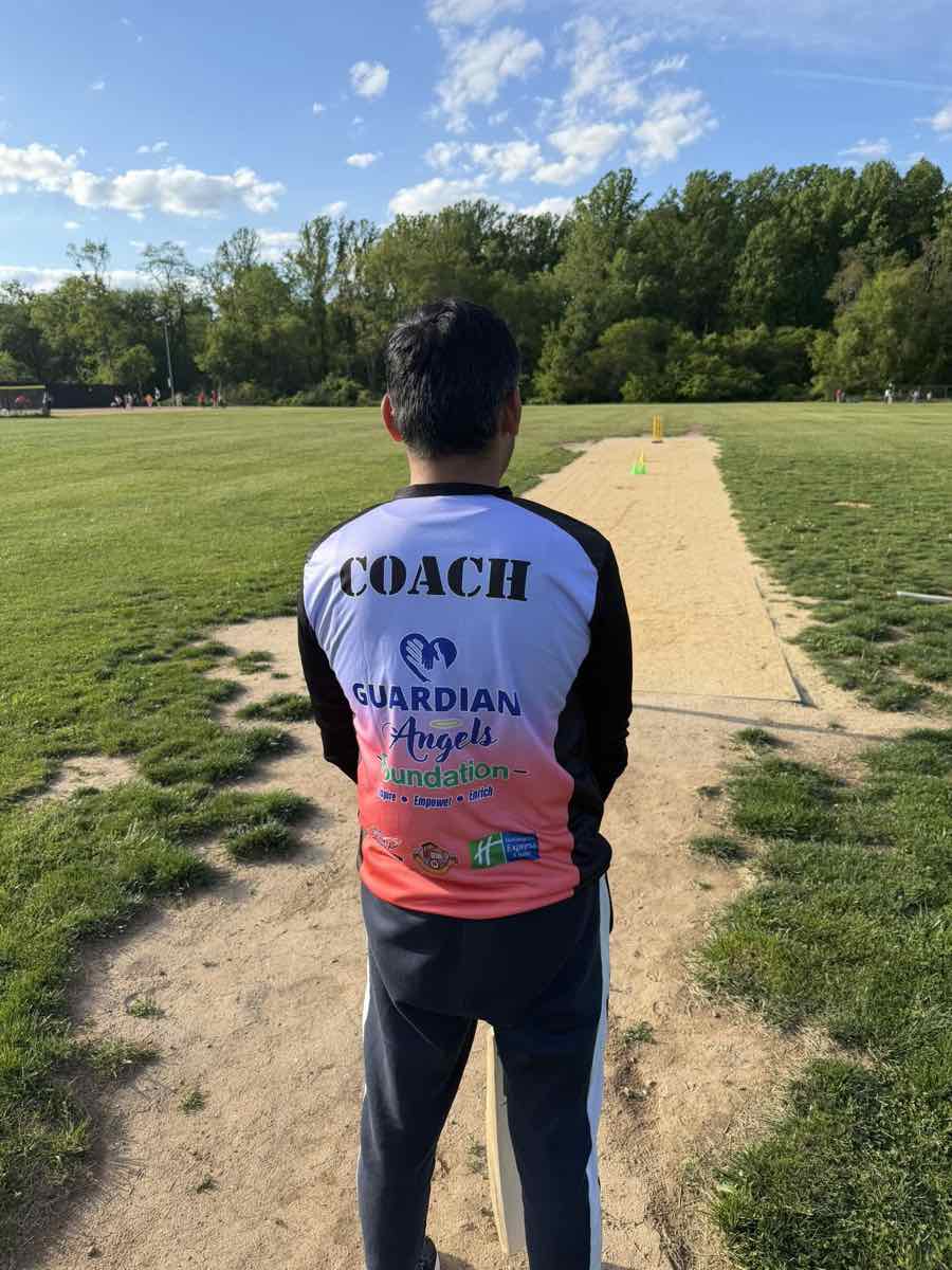 Coach looking down the pitch during practice