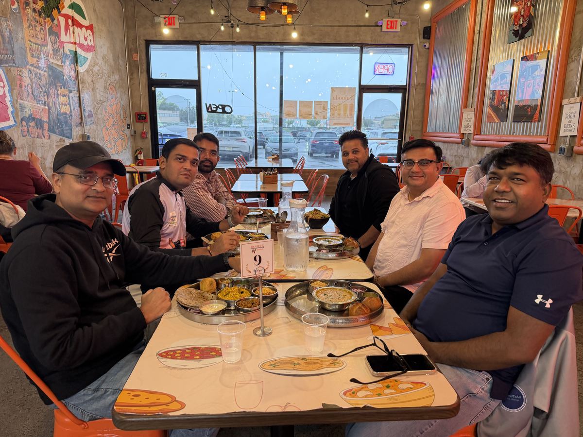 Coaches and organizers sharing dinner together
